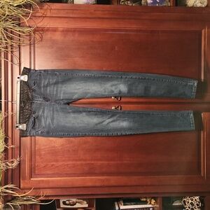 Distressed Black Coated Waist Band Skinny Jeans.